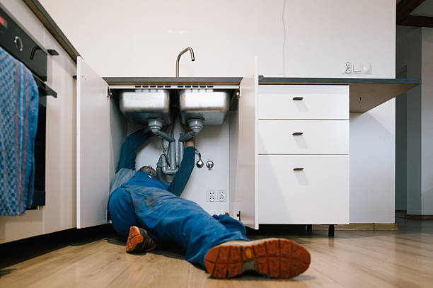 Professional Drain Cleaning technician working in Rogersville, MO